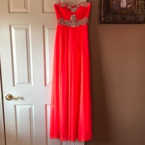 Floor length strapless coral formal dress. Size 3